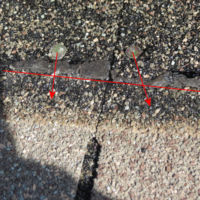 improper nailing at roof shingles