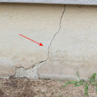Crack at the foundation fascia shows evidence of some rotation as the crack is larger at the top than the bottom. foundation crack